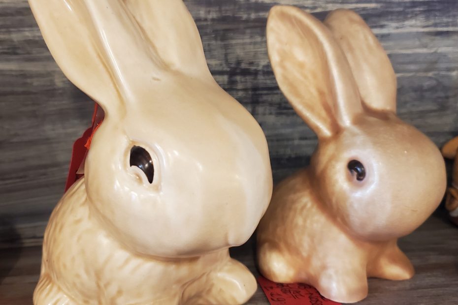 Photograph of 2 identical bunny ornaments, 1 large and 1 small.