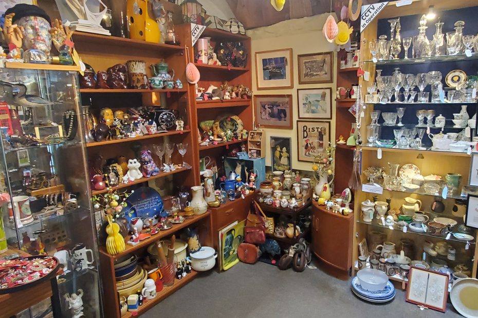 Photograph of shelves bursting with vintage goods at Sail Loft Emporium